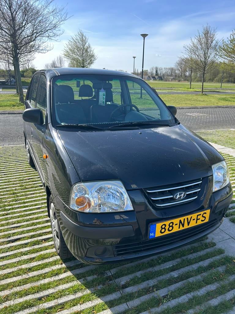 Hyundai Atos 1.1 2004 Zwart, Auto's, 31 €/maand, 4 cilinders, Zwart, Origineel Nederlands