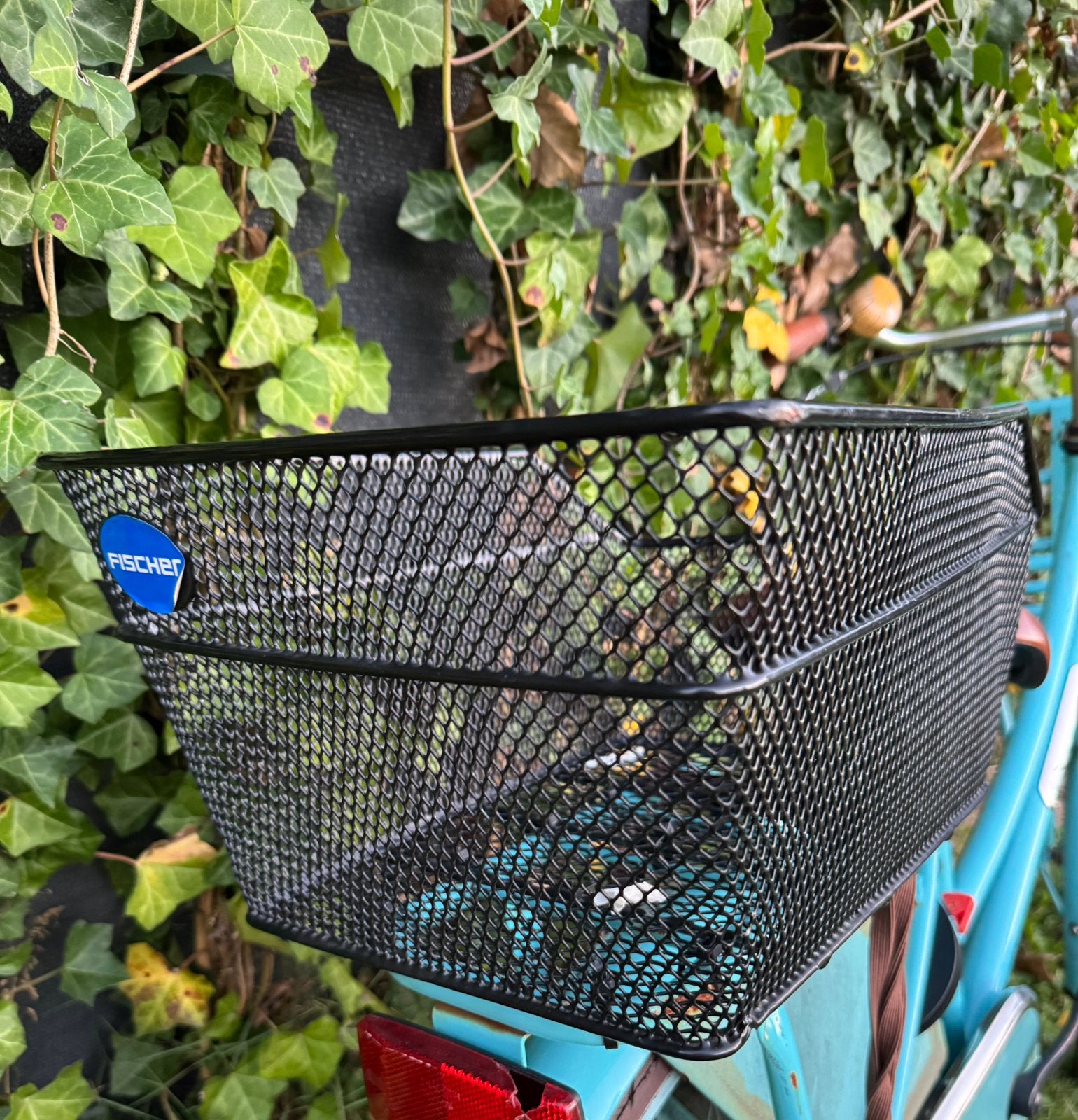 Fischer fietsmand zwart, Ophalen