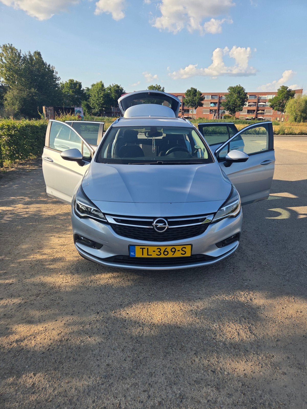 Opel Astra 1.0 Turbo 77KW Sports Tourer 2018 Grijs, Auto's, Voorwielaandrijving, Stof, Zwart, Origineel Nederlands