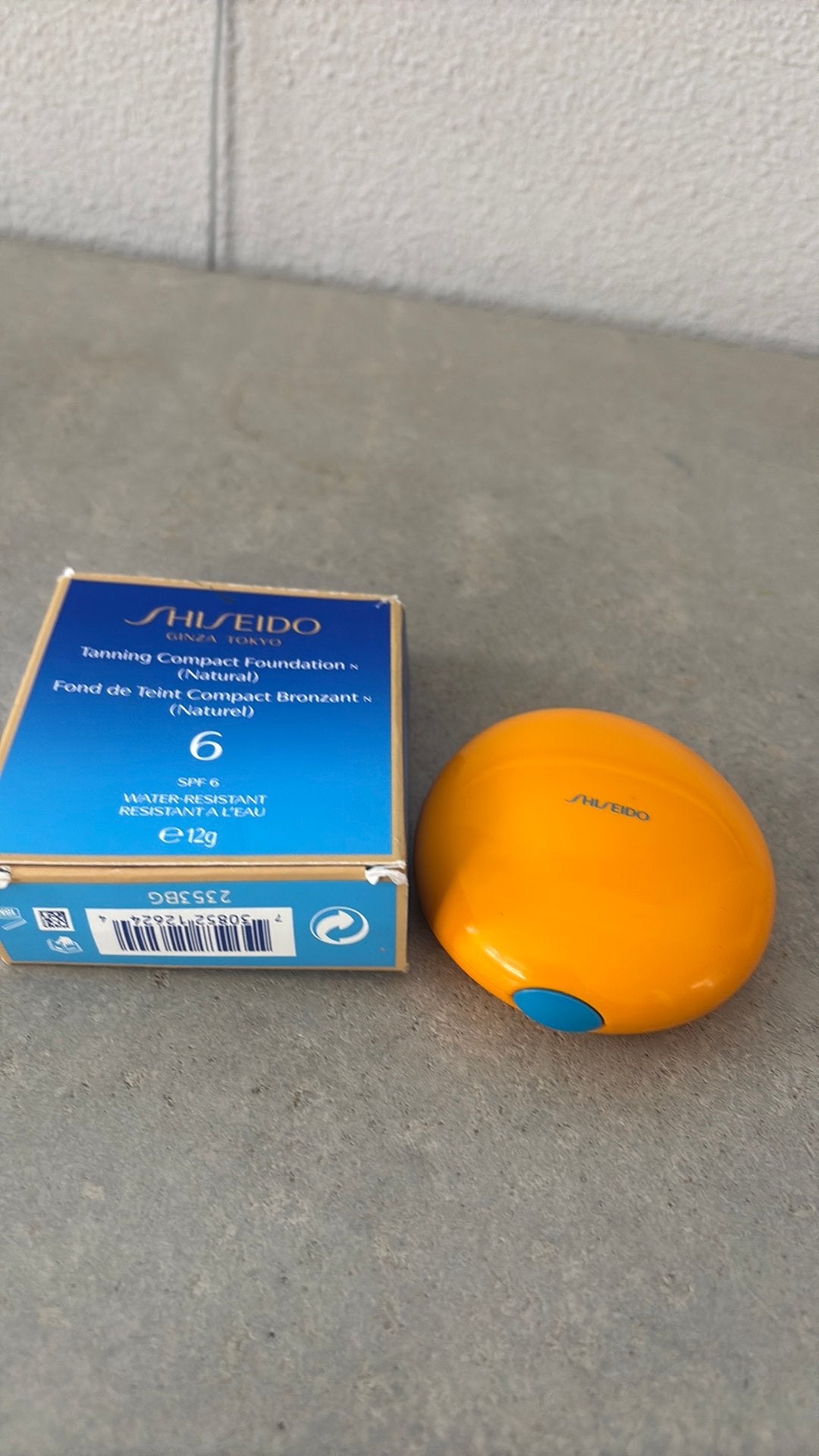 Shiseido tanning compact foundation kleur 6, Ophalen of Verzenden, Gebruikt, Beige, Gehele gezicht