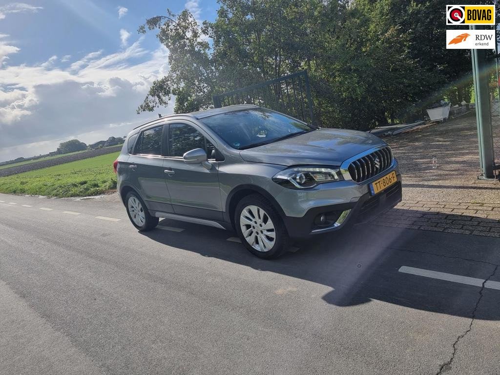 Suzuki S-Cross 1.0 Boosterjet Exclusive, Auto's, Voorwielaandrijving, Gebruikt, Verwarmde buitenspiegels, 400 kg