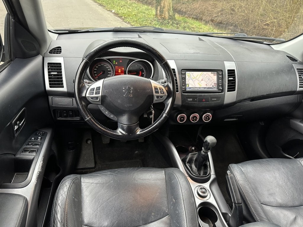 Peugeot 4007 2.2 HDiF Platinum | 7p | trekhaak | airco |, Auto's, Peugeot, Euro 5, Gebruikt, Zwart, 7 stoelen