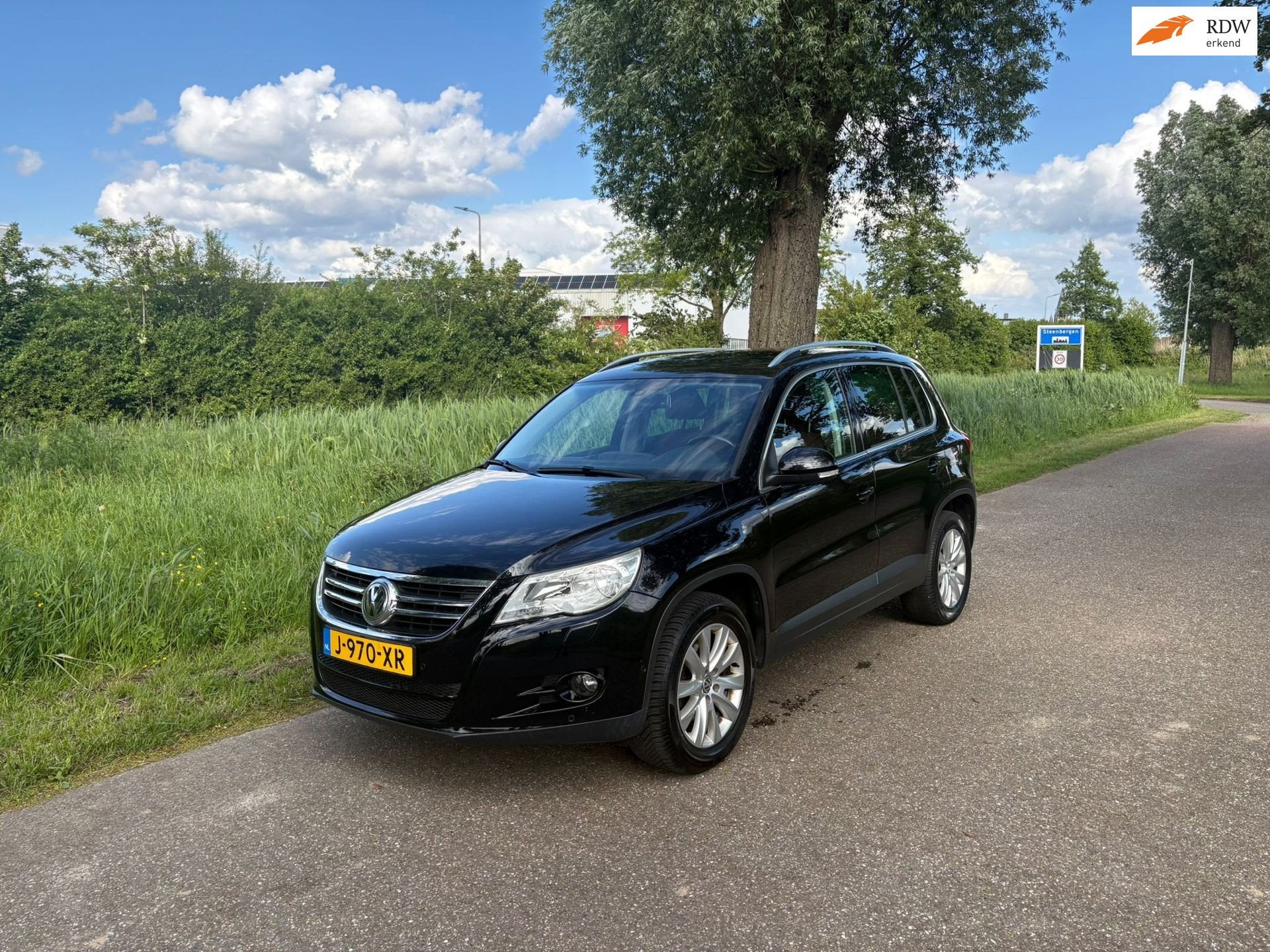 Volkswagen Tiguan 1.4 TSI Sport&Style 4Motion 1e Eigenaar St, Auto's, Volkswagen, Euro 5, Gebruikt, 4 cilinders, Zwart