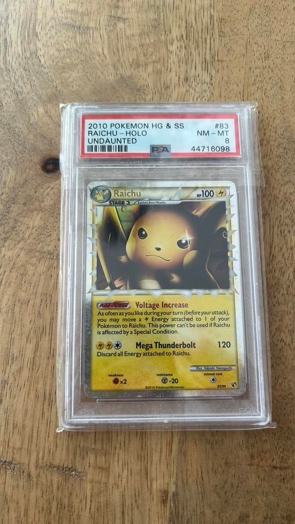 Pokemon Raichu Prime Undaunted PSA 8, Ophalen of Verzenden, Zo goed als nieuw