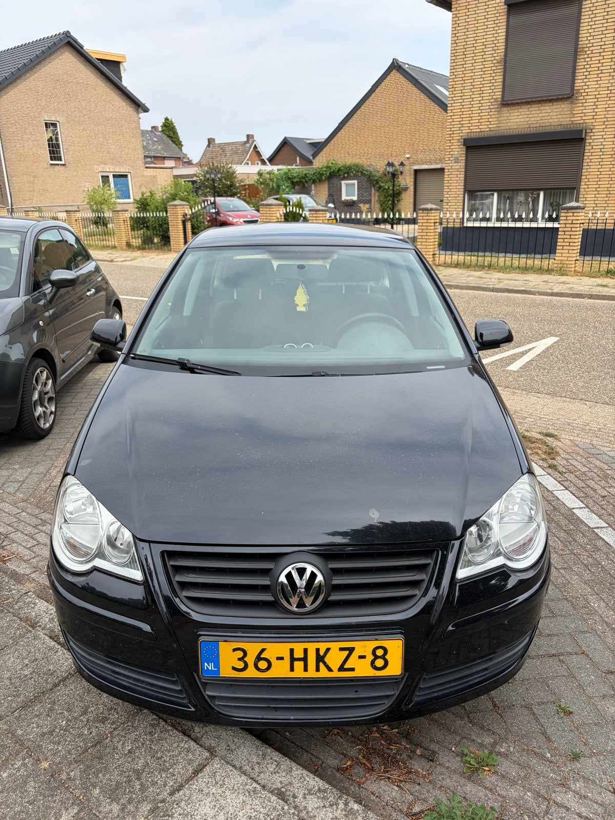 Volkswagen Polo 1.4 16V 59KW 2009 Zwart, Auto's, Volkswagen, Voorwielaandrijving, 4 cilinders, Zwart, Handgeschakeld
