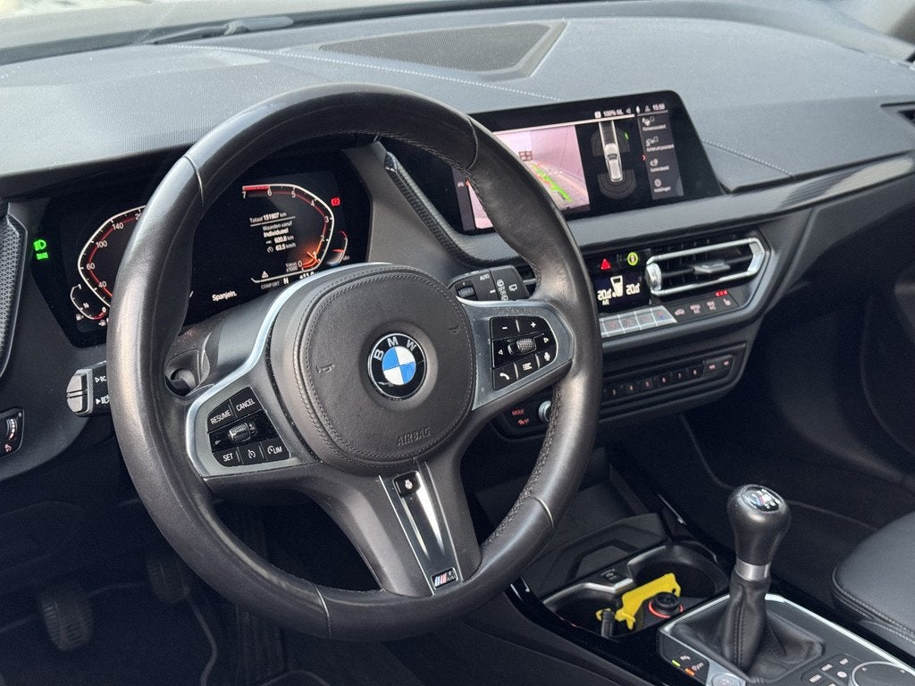 BMW 1-serie 118i Executive Edition, Auto's, BMW, Gebruikt, Automatische klimaatregeling, Leder en Stof, Zwart