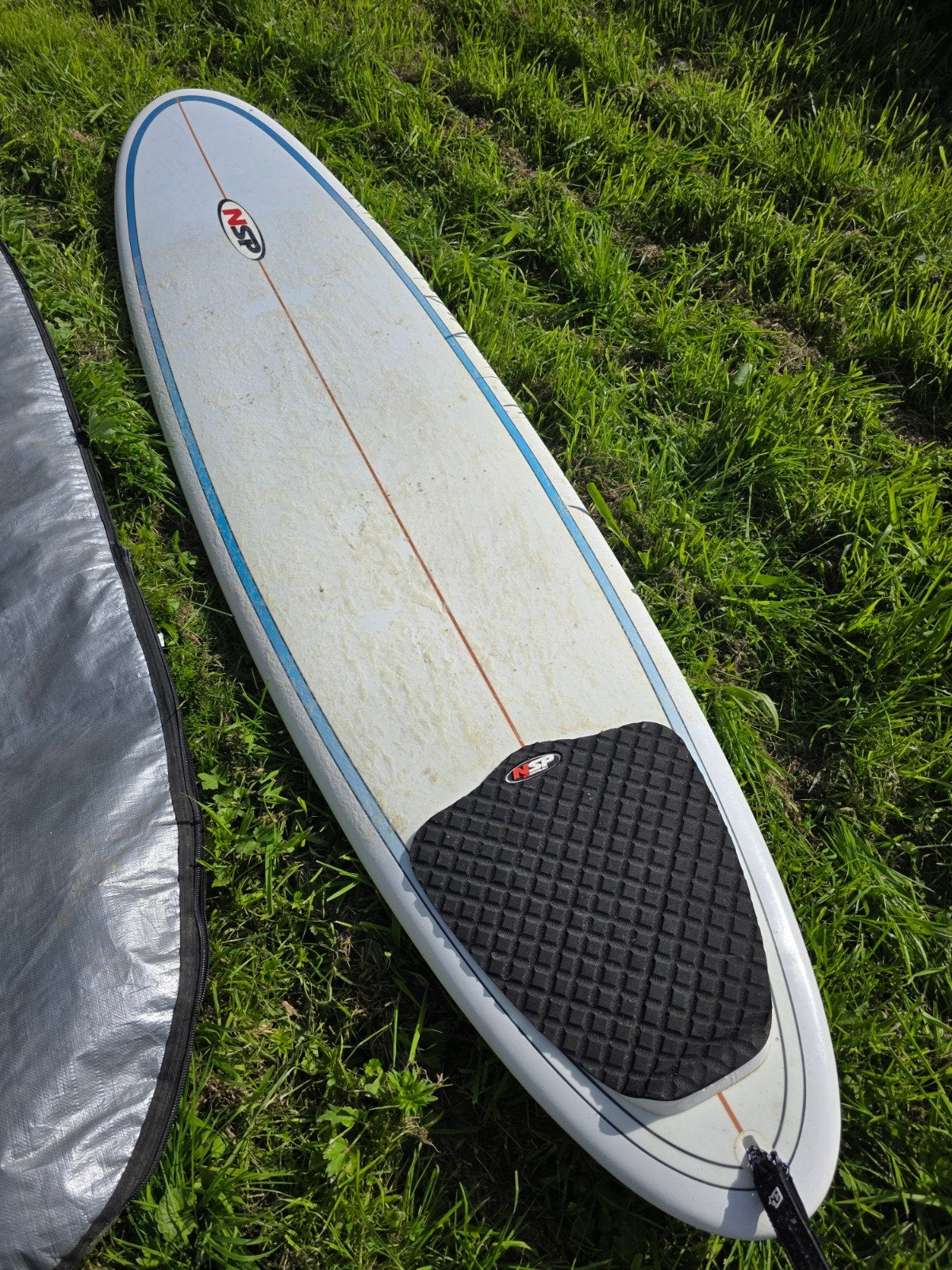 NSP 7'6 surfboard inclusief boardbag en leash, Watersport en Boten, Ophalen of Verzenden, Zo goed als nieuw, Overige typen, Met vinnen