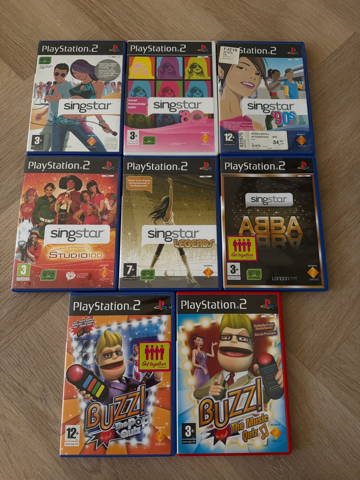 Playstation 2 - Singstar en Buzz! 8 games, Ophalen, Muziek, Gebruikt, 3 spelers of meer