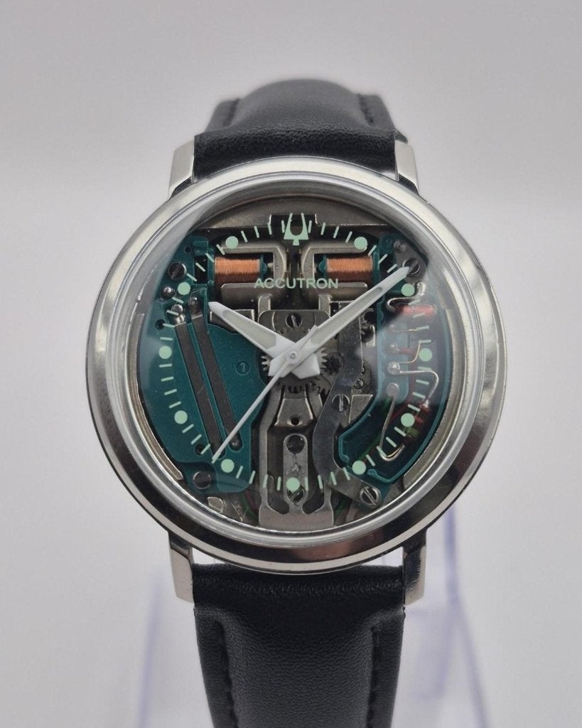 Bulova Accutron 214 Spaceview 1961 M1 stemvork staal, Antiek en Kunst, Ophalen of Verzenden