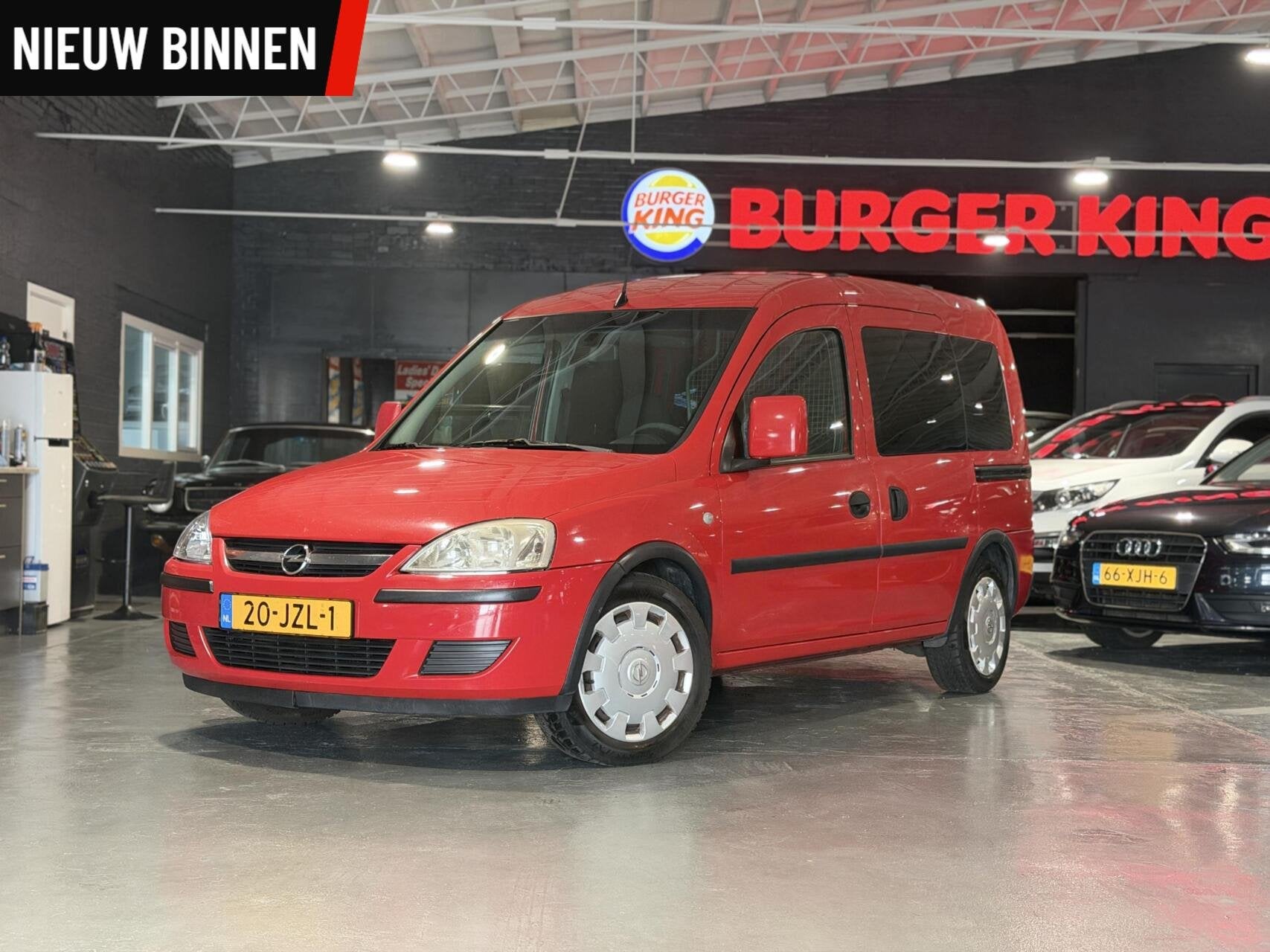 Opel Tour 1.4-16V Enjoy Airco Benzine achterbank, Auto's, Voorwielaandrijving, Gebruikt, Overige modellen, 4 cilinders