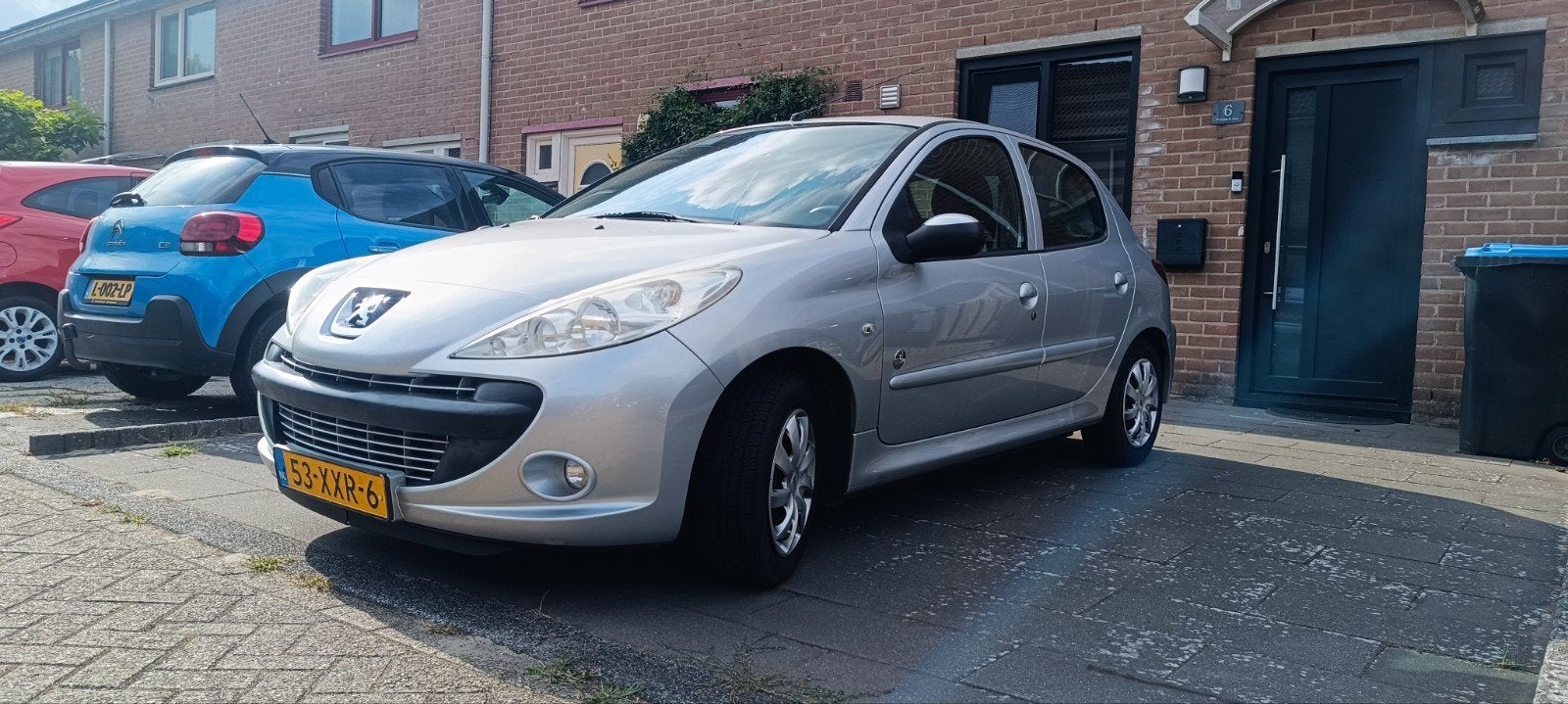 Peugeot 206+ 1.4 5D 2012 Grijs, Auto's, 206+, 4 cilinders, Origineel Nederlands, Handgeschakeld