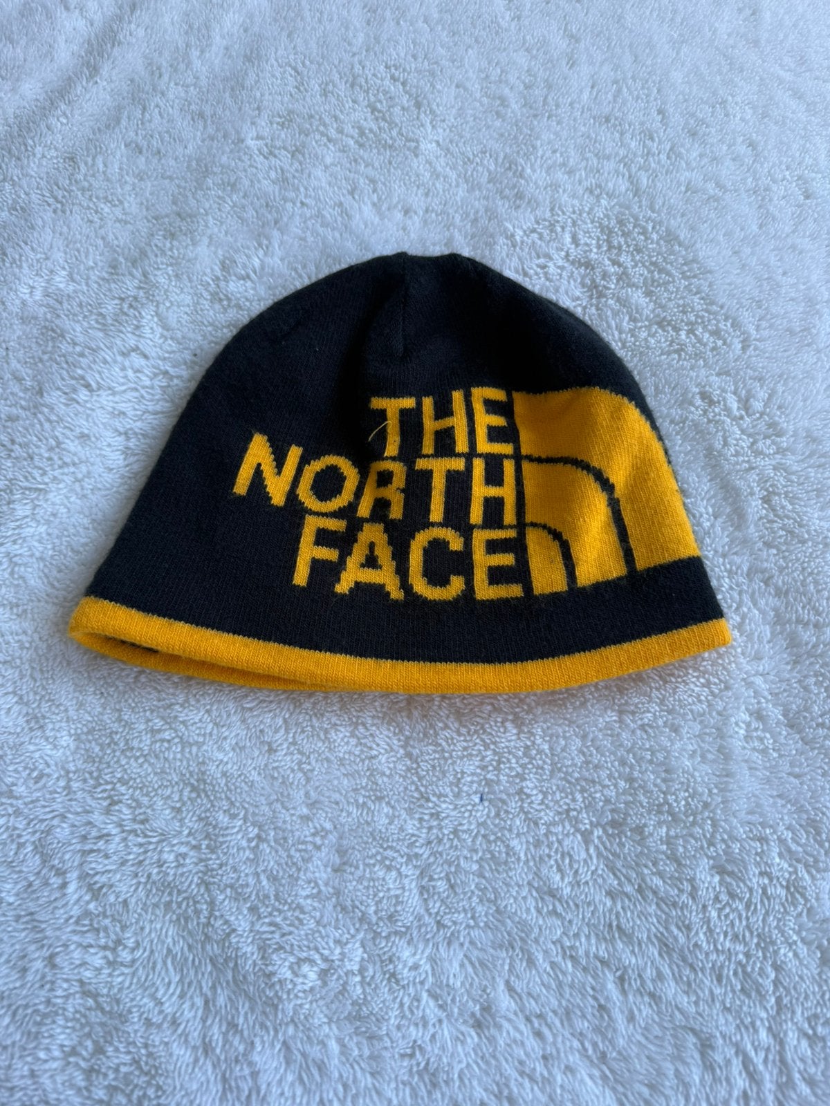 Muts tiener tweezijdig merk the north face in nette staat, Kinderen en Baby's, Ophalen of Verzenden, Zo goed als nieuw, Jongen