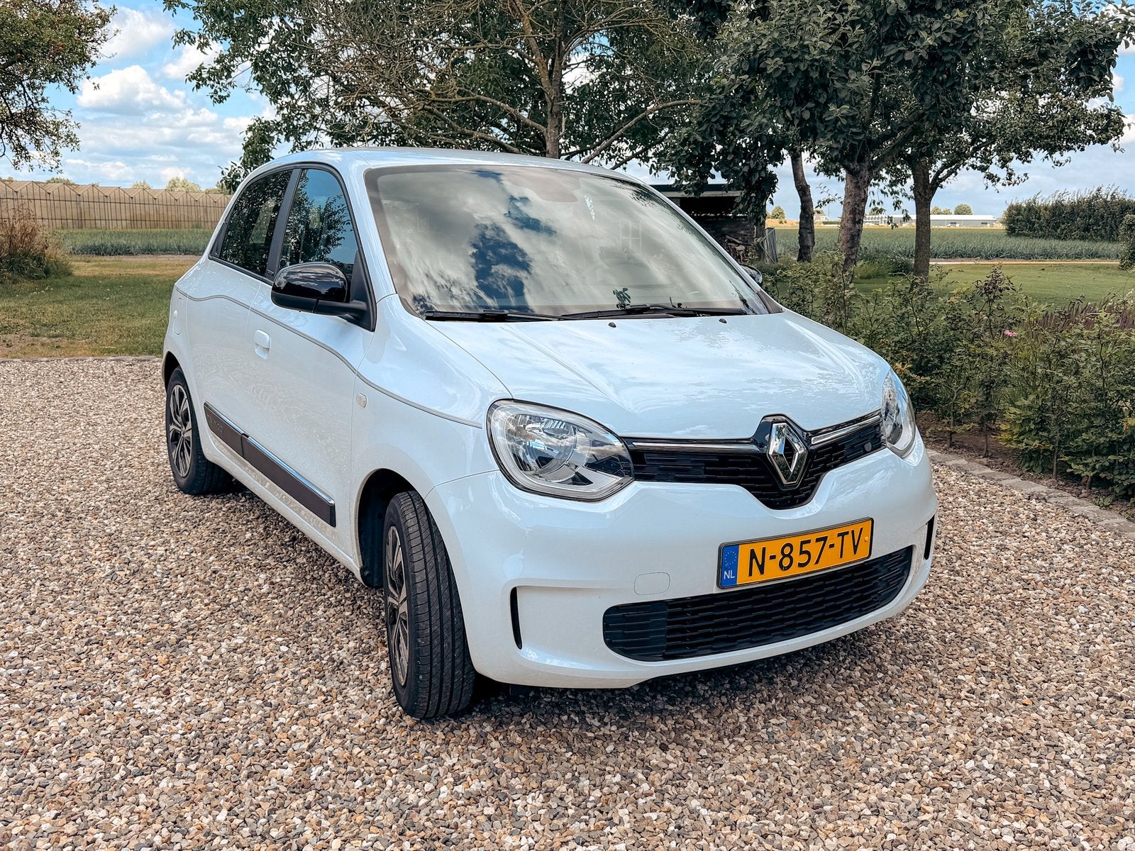 Renault Twingo 1.0 SCe Limited 2022 Blanc cristal qnj, Auto's, 31 €/maand, Start-stop-systeem, 4 stoelen, Wit