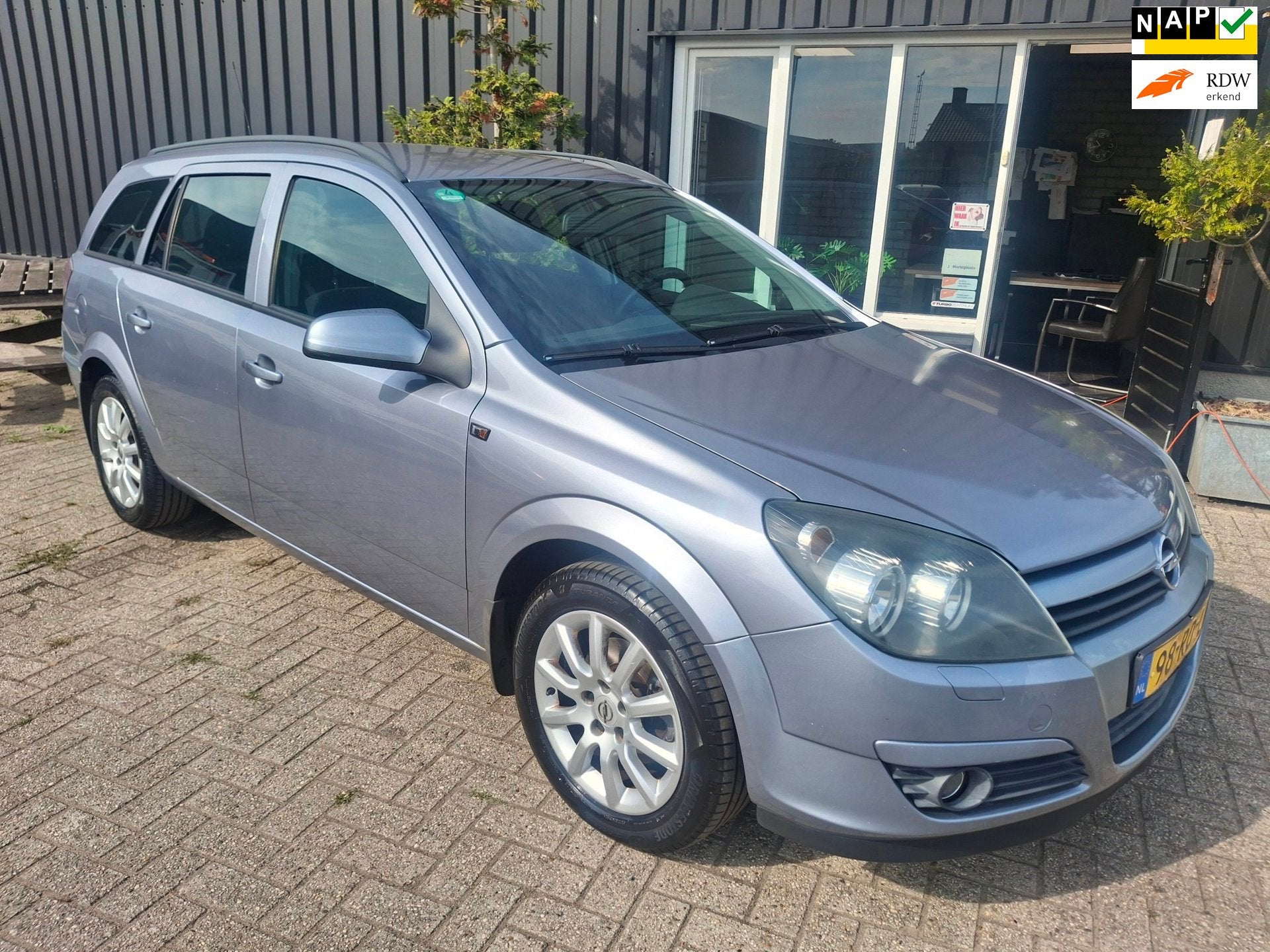 Opel Astra Wagon 1.6 Enjoy, Auto's, Voorwielaandrijving, Gebruikt, Zwart, 4 cilinders