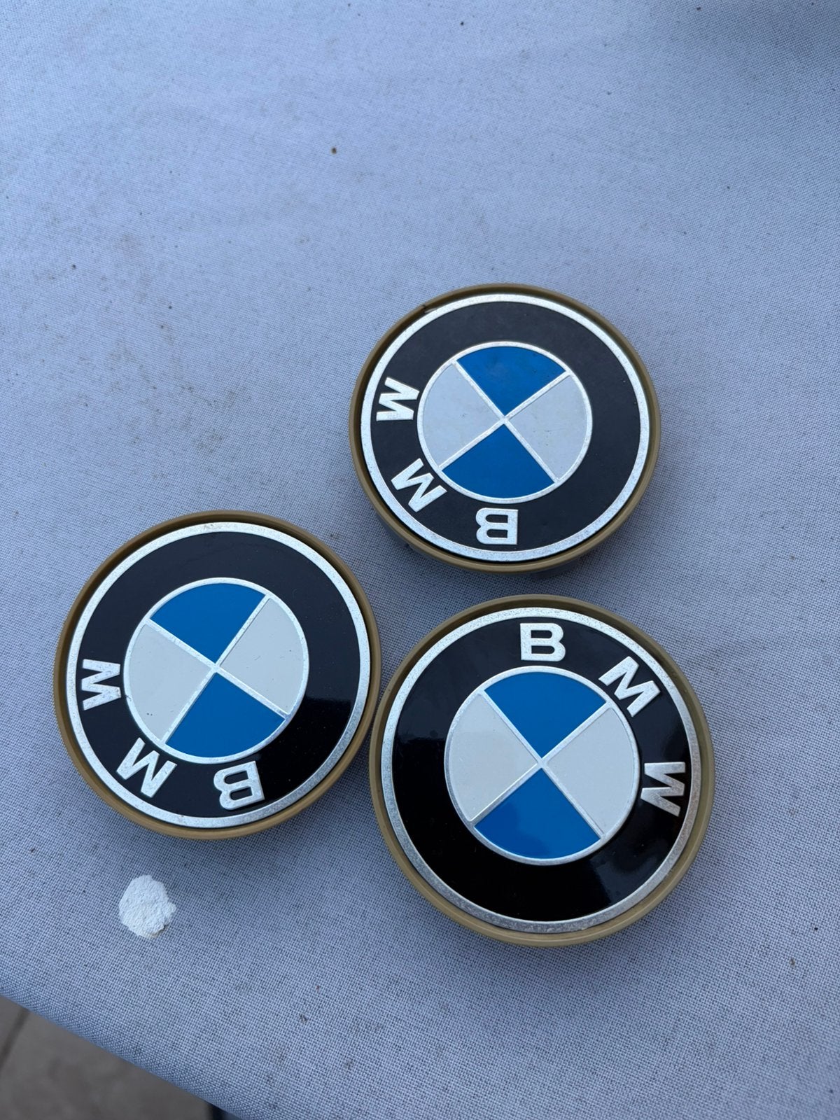 3x gebruikte naafkappen BMW 68mm, Ophalen of Verzenden, Zo goed als nieuw
