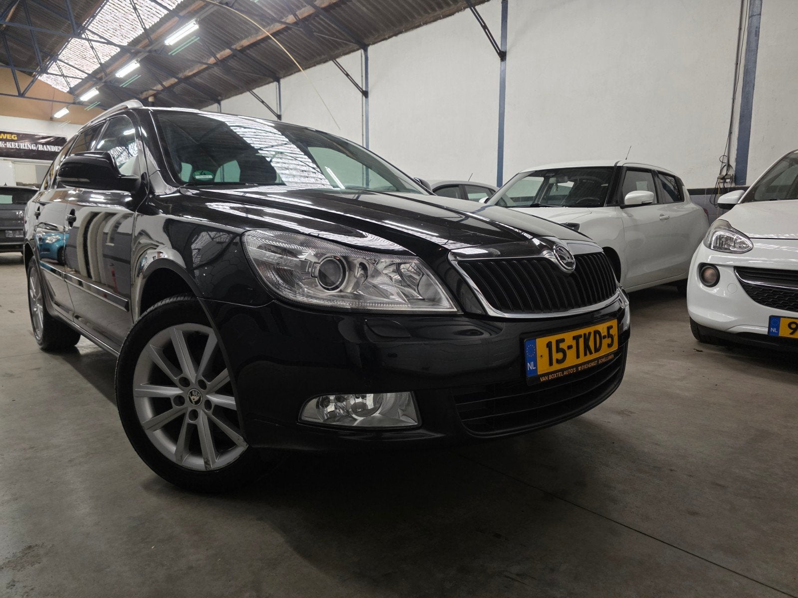 Skoda Octavia 1.2 TSI Combi DSG Automaat Garantie Novi Parks, Auto's, 4 cilinders, Zwart, Origineel Nederlands, Parkeersensor