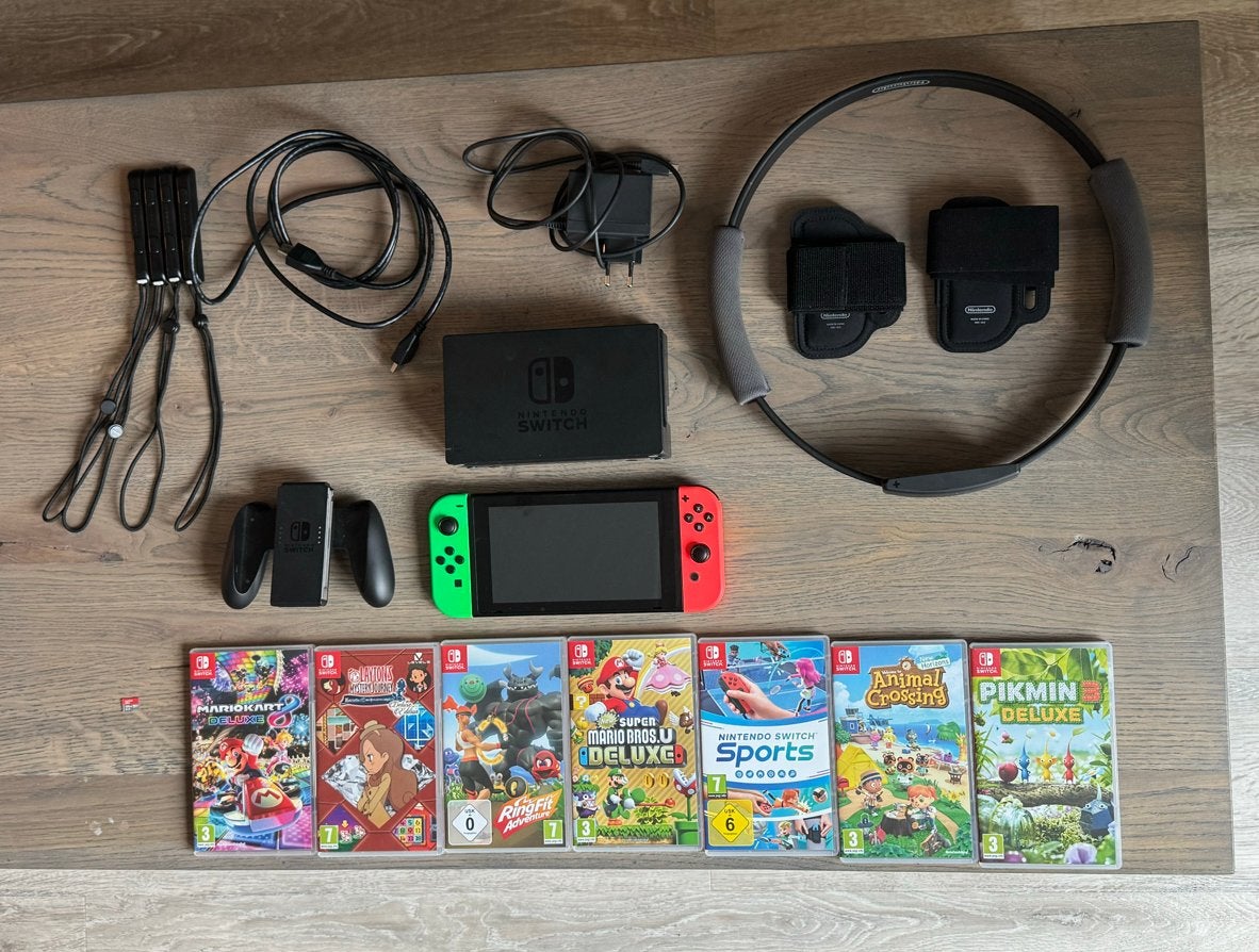 Nintendo Switch V1 met 7 games, Ring Fit en 128GB SD kaart, Ophalen, Met games, Met 2 controllers, Zo goed als nieuw