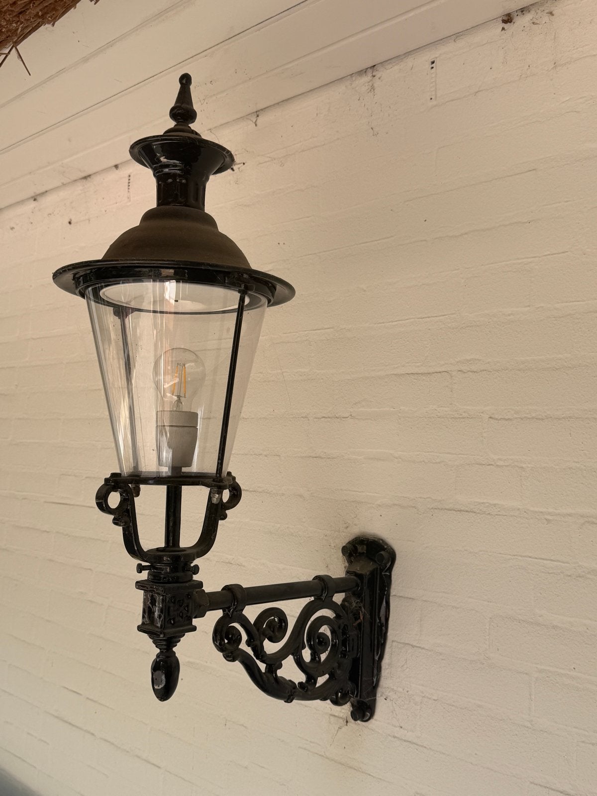 Set van 2 gietijzeren wandlampen buiten van Pako Rhenen, Ophalen