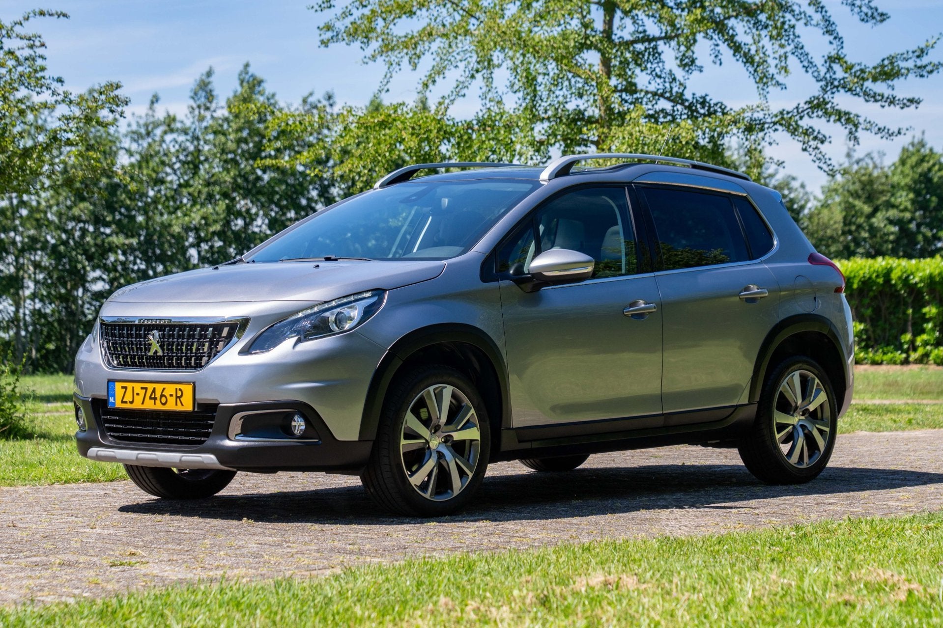 Peugeot 2008 1.2 PureTech Allure Pano. 48.600 km +NAP NL-aut, Auto's, Dealer onderhouden, Euro 6, 1199 cc, Leder en Stof