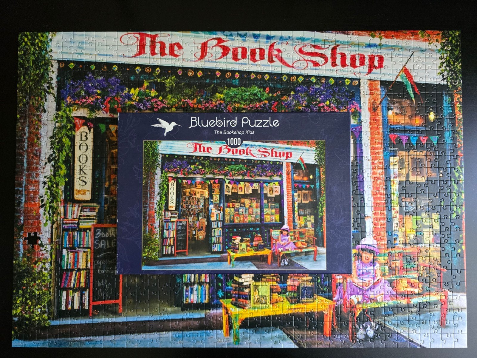 Bluebird puzzel 1000 st - The Book Shop Kids - Aimee Stewart, Ophalen of Verzenden, 500 t/m 1500 stukjes, Zo goed als nieuw, Legpuzzel