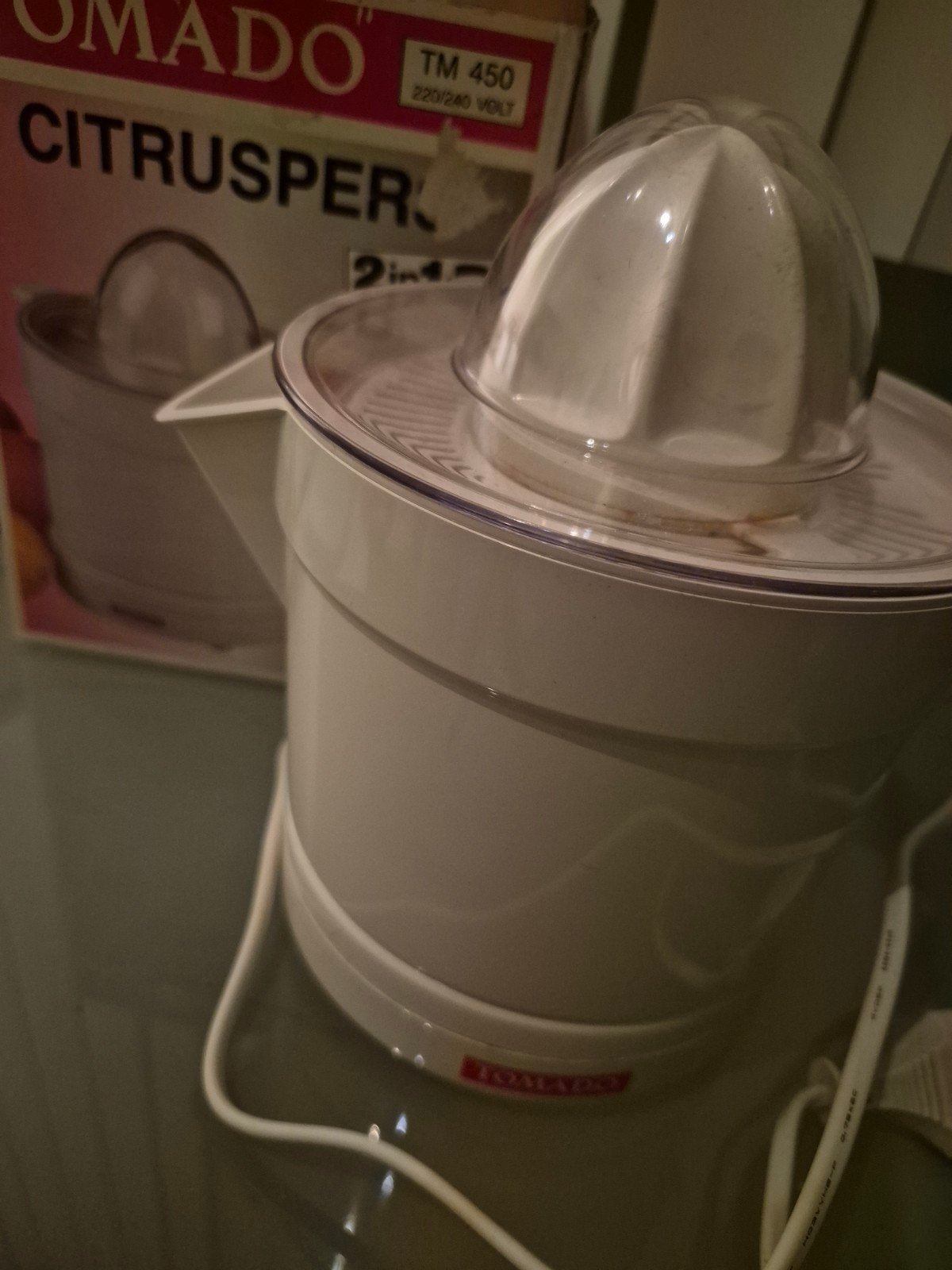 Omado Citruspers TM 450 - 2-in-1 sapcentrifuge, Ophalen