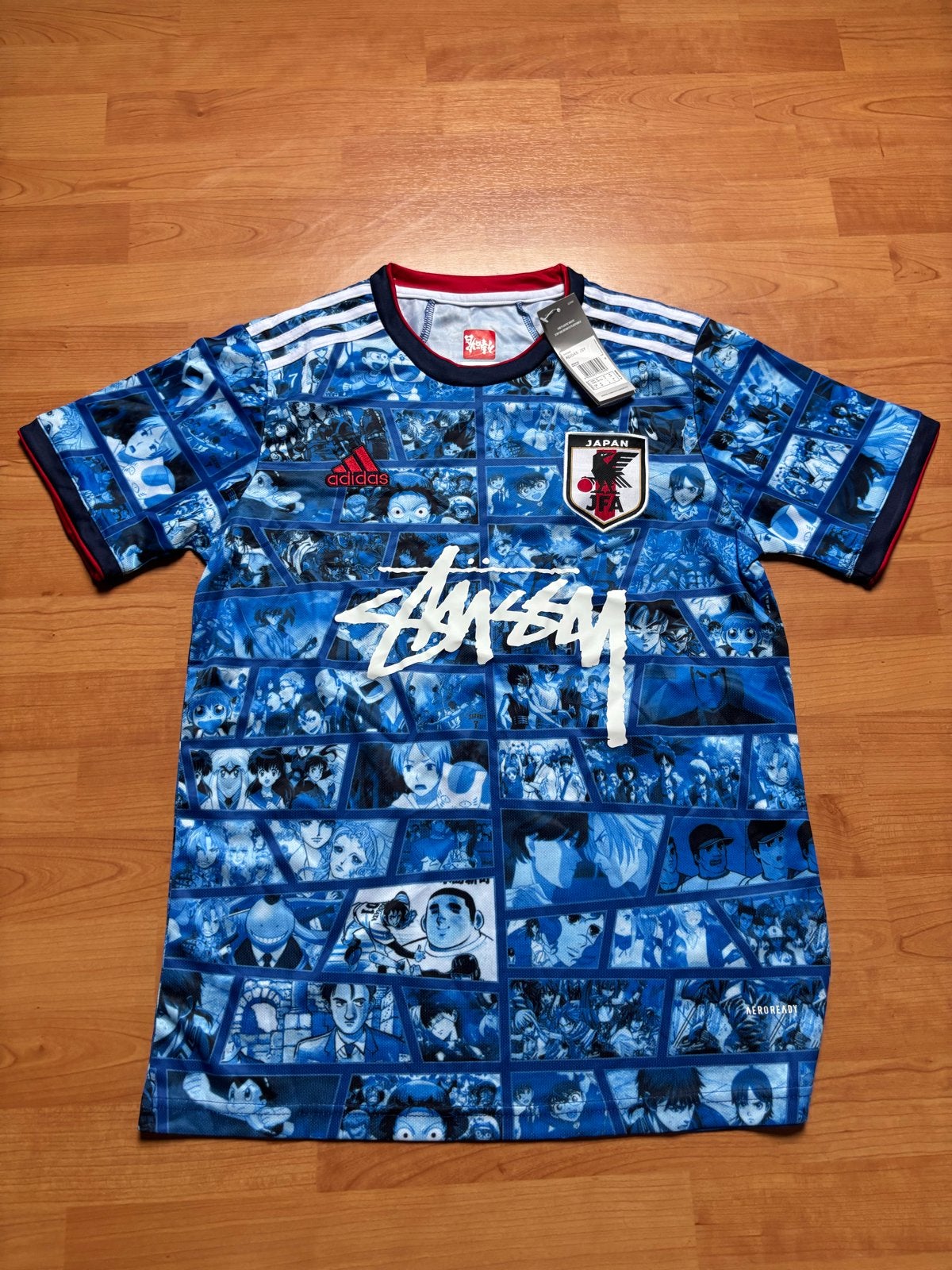 Adidas Japan JFA Stussy Manga Voetbalshirt Maat M, Kleding | Heren, T-shirts, Ophalen of Verzenden, Nieuw, Maat 48/50 (M), Blauw