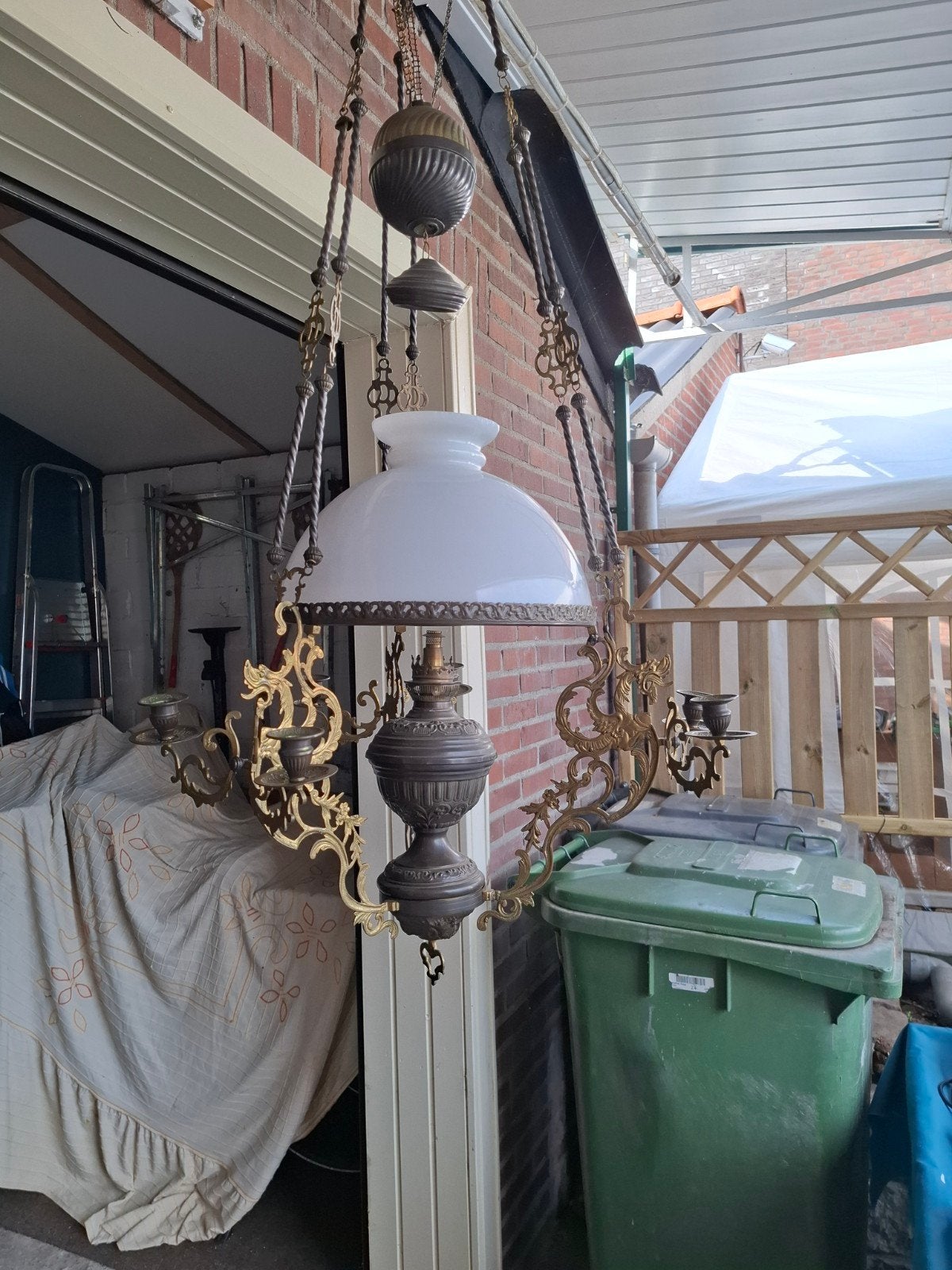 Antieke bronzen hanglamp, Ophalen