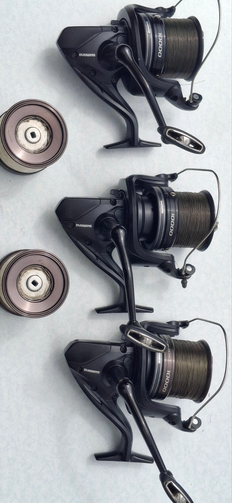 Set van 3 Shimano 10000 vismolens met extra spoelen, Ophalen, Molen