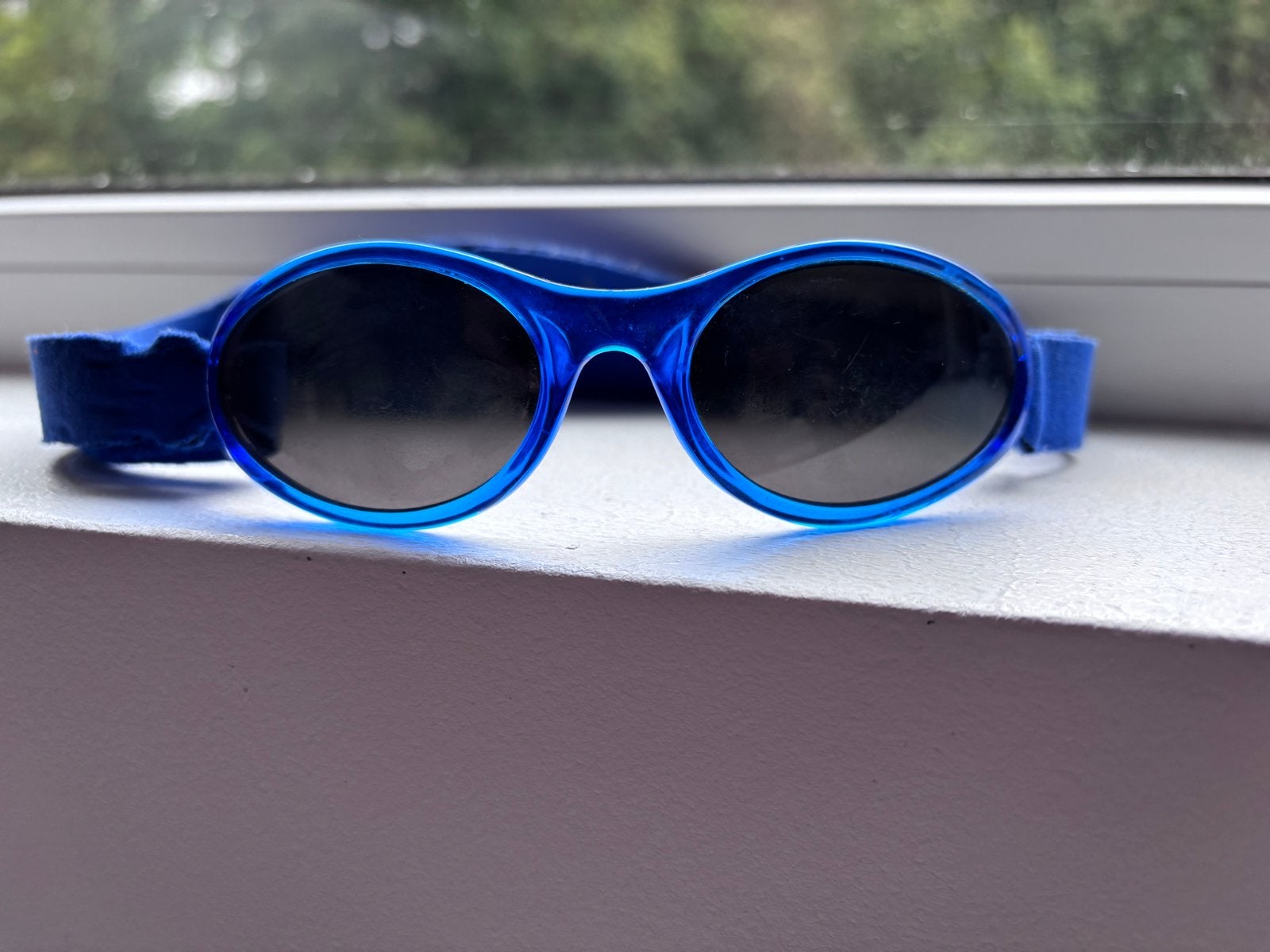 Baby zonnebril Kidz Banz, Ophalen, Gebruikt