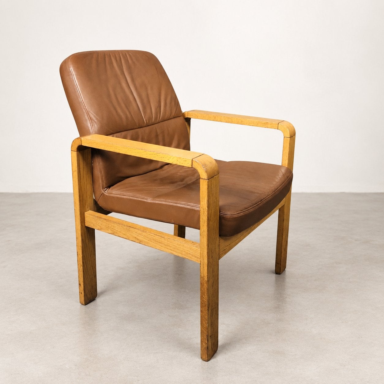 Vintage Sedus armstoel jaren 70 – eikenhout en cognac leer, Huis en Inrichting, Ophalen of Verzenden, Gebruikt, Hout, 50 tot 75 cm