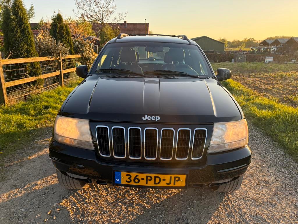 Jeep Grand Cherokee 4.7 I V8 Limited AUT 1999 Zwart, Automaat, 1826 kg, 8 cilinders, 3360 kg