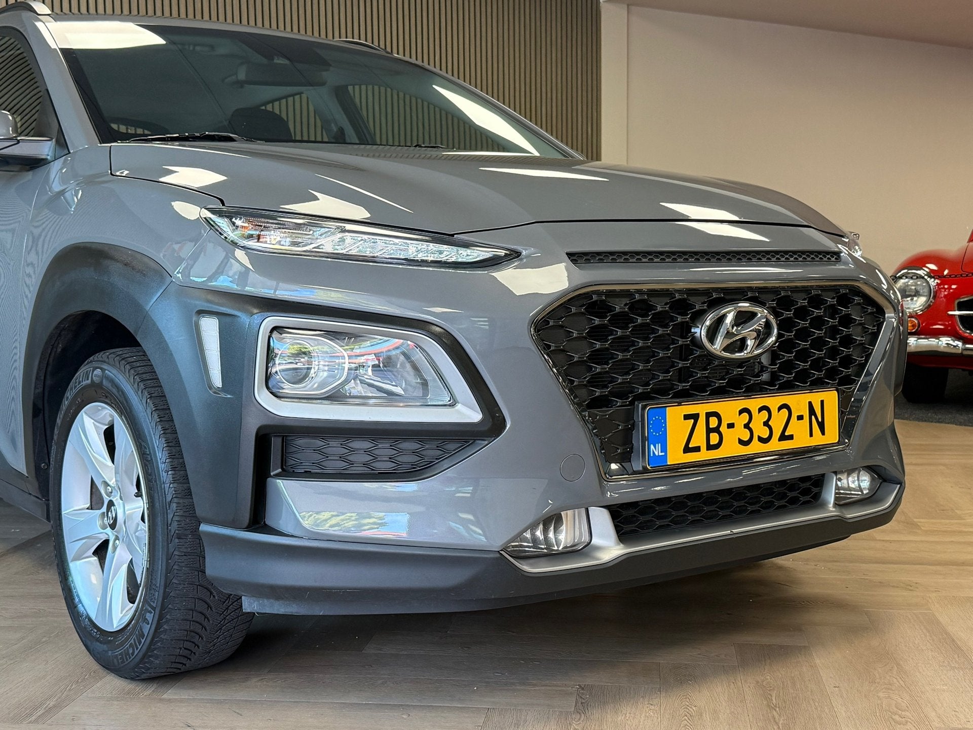 Hyundai Kona 1.0 T-GDI Comfort NAVI CAMERA CLIMATE CRUISE CO, Stof, Gebruikt, Met garantie (alle), Origineel Nederlands