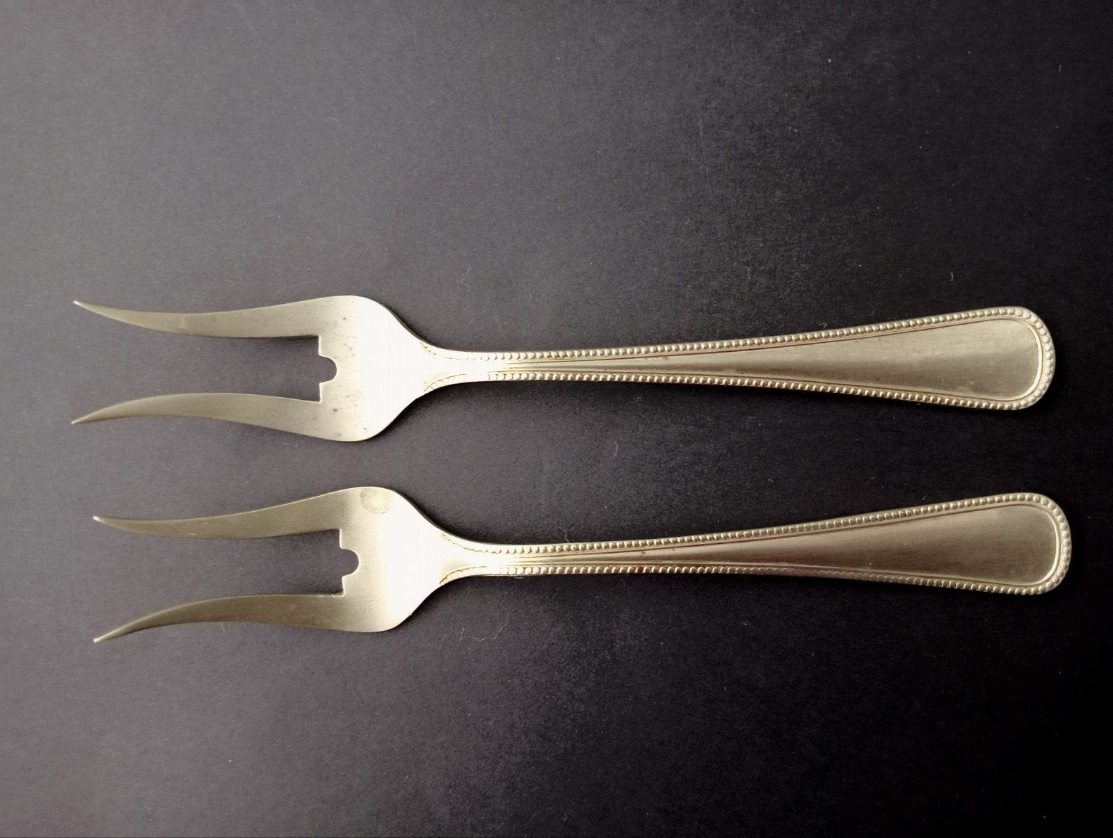 Set van 2 vintage zilverkleurige vleesvorkjes, Ophalen of Verzenden