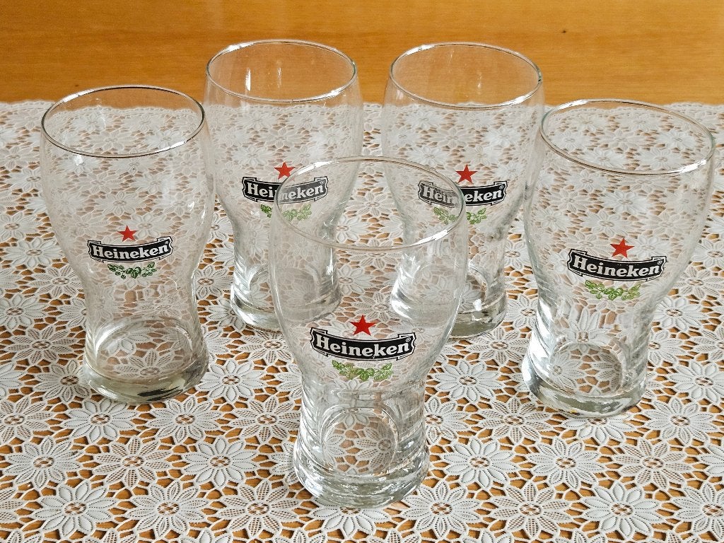 Set van 5 Heineken bierglazen, Ophalen of Verzenden, Gebruikt, Glas of Glazen, Heineken