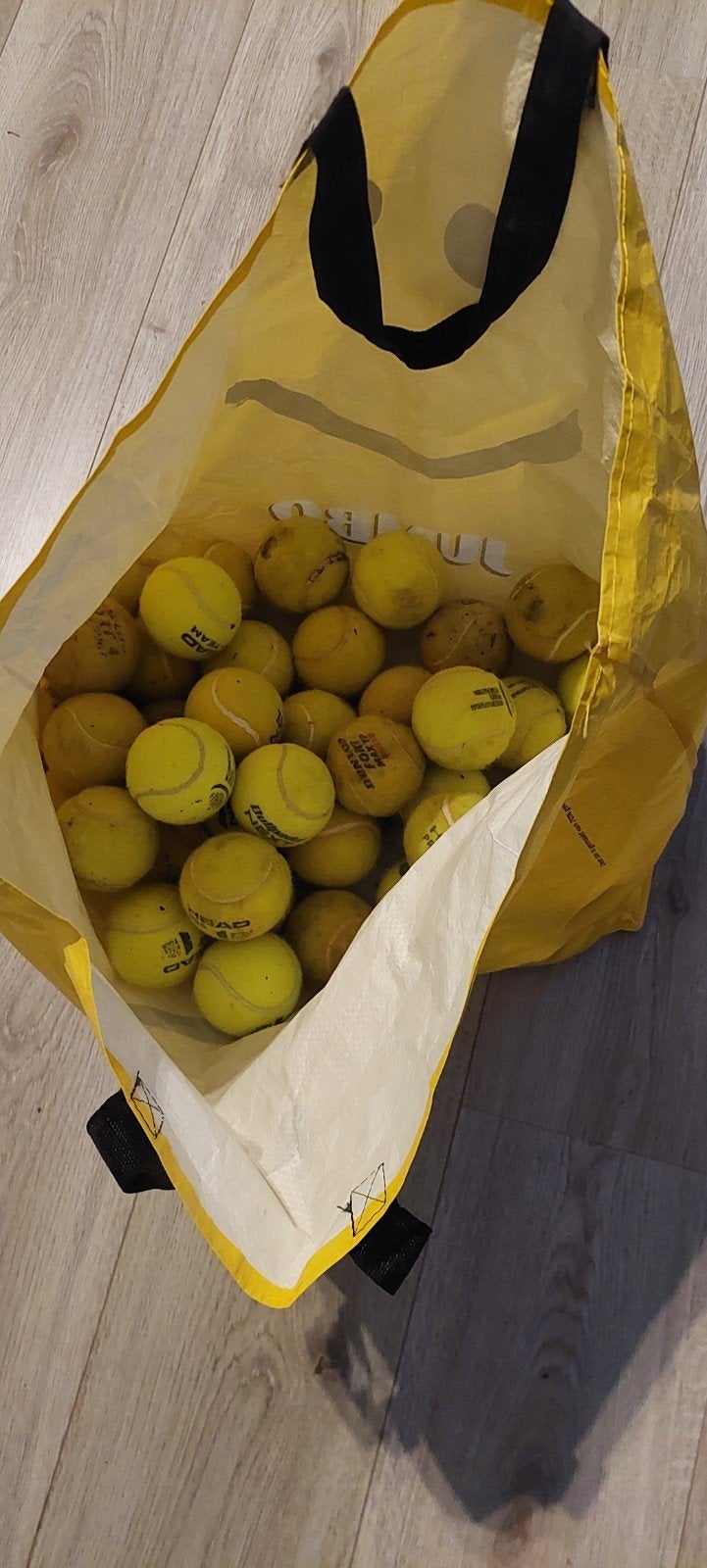 Tennisballen, Ophalen