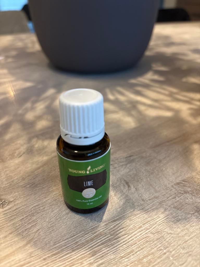 Young Living Lime Essentiële Olie 15ml, Sieraden, Tassen en Uiterlijk, Ophalen of Verzenden, Nieuw, Bodylotion, Crème of Olie