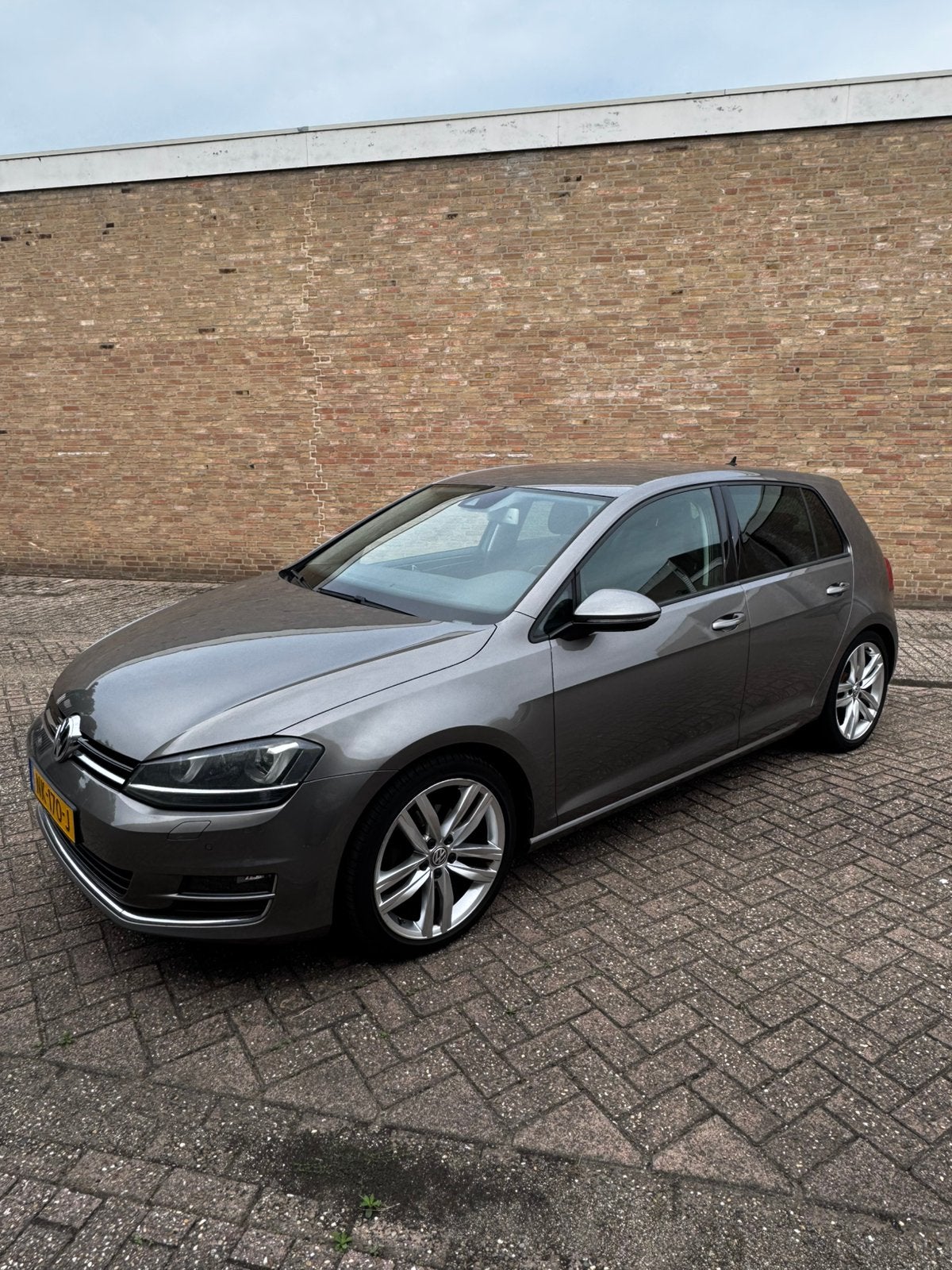 Volkswagen Golf 1.4 TSI 92KW 5D DSG 2016 Grijs, Auto's, Bluetooth, 125 pk, Zwart, 4 cilinders