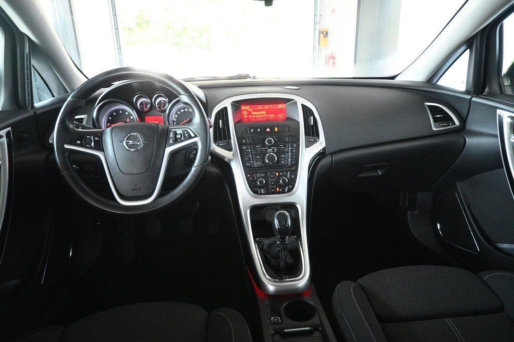 Opel Astra Sports Tourer 1.4 Cosmo Airco Cruise Control Trek, Voorwielaandrijving, Euro 5, Gebruikt, 4 cilinders