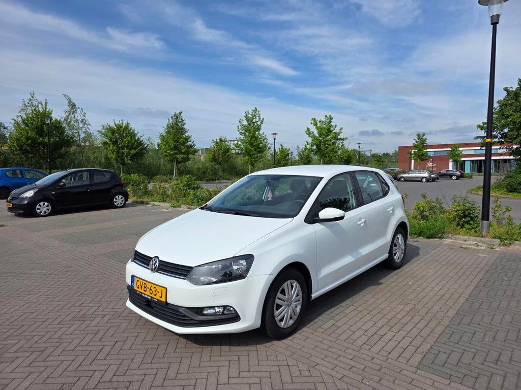 Volkswagen Polo 2014 | Airco | Stoelverwarming | Cruise, Auto's, Wit, Handgeschakeld, 3 cilinders, Geïmporteerd