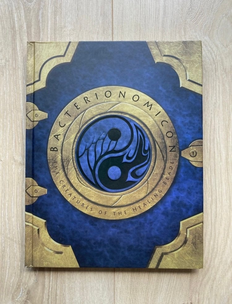 Bacterionomicon: The Creatures of the Healing Blade, Ophalen of Verzenden, Zo goed als nieuw