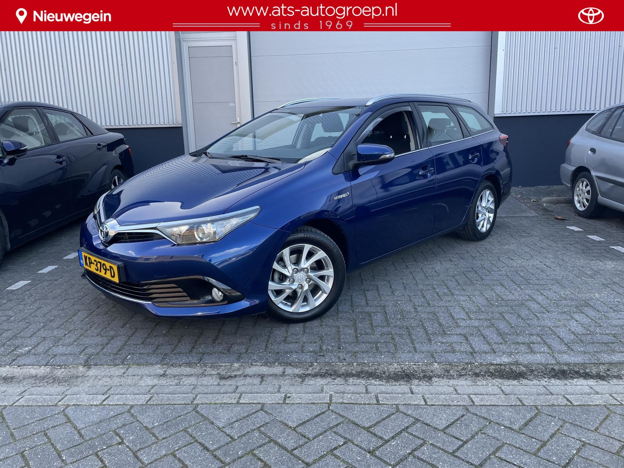 Toyota Auris Touring Sports 1.8 Hybrid Aspiration, Auto's, Dealer onderhouden, Gebruikt, Euro 6, Blauw