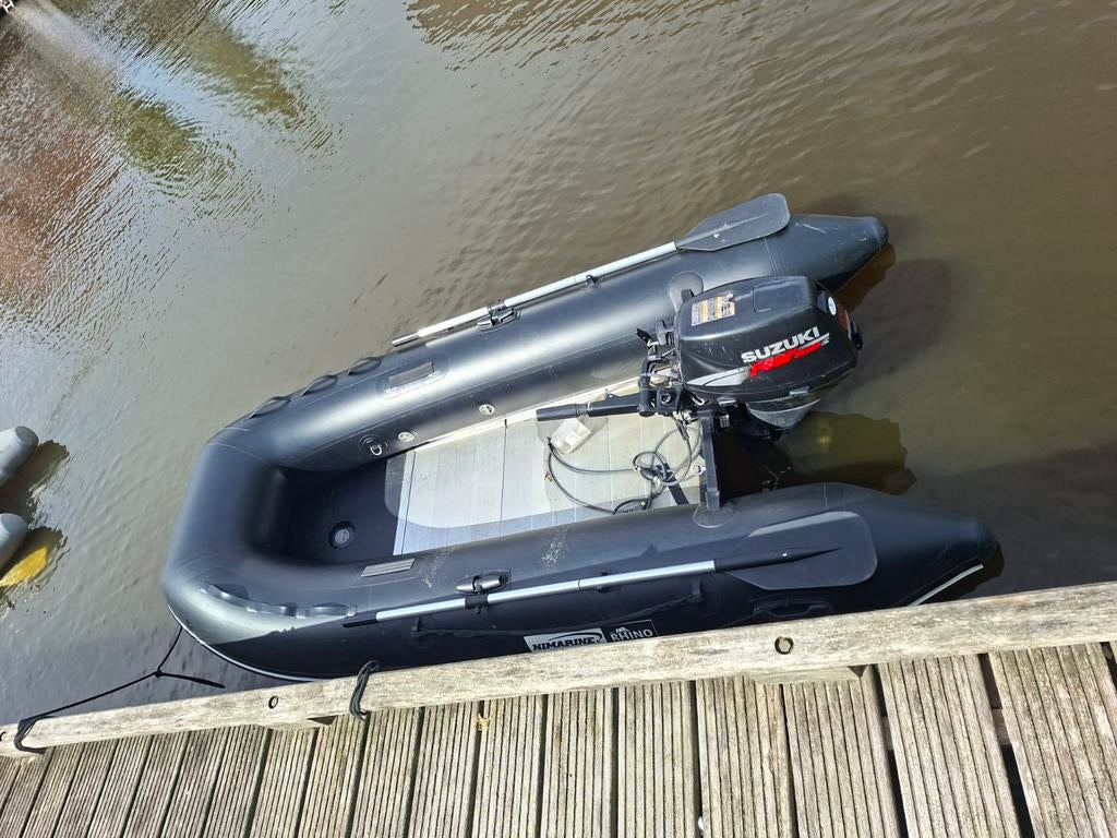 Rubberboot met Suzuki buitenboordmotor, Ophalen, Zo goed als nieuw