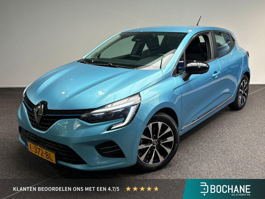 Renault Clio 1.6 E-Tech Hybrid 140 Intens | 360 Camera | Nav, Auto's, Gebruikt, 4 cilinders, Met garantie (alle), Blauw