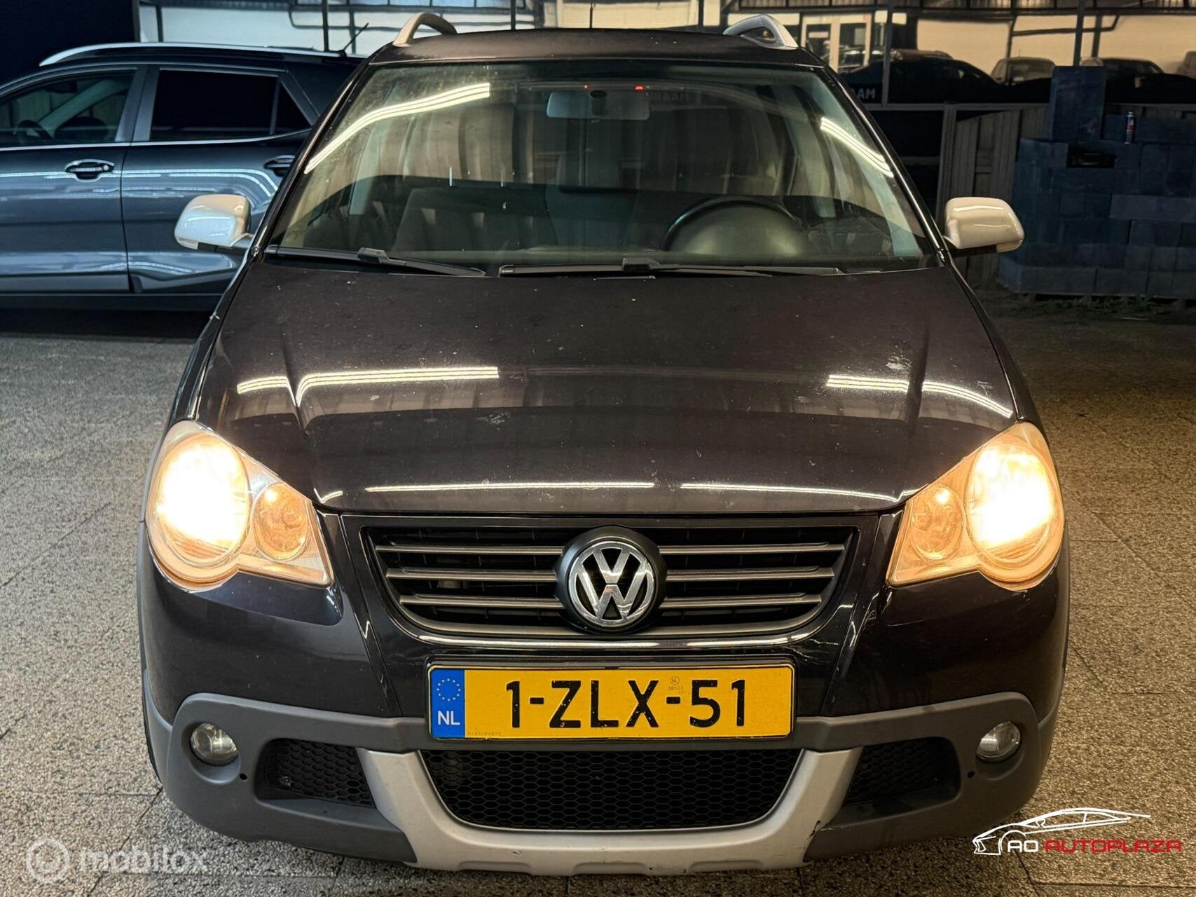 Volkswagen Polo 1.2-12V Cross INRUILKOOPJE, Auto's, Voorwielaandrijving, 1057 kg, 1198 cc, Zwart