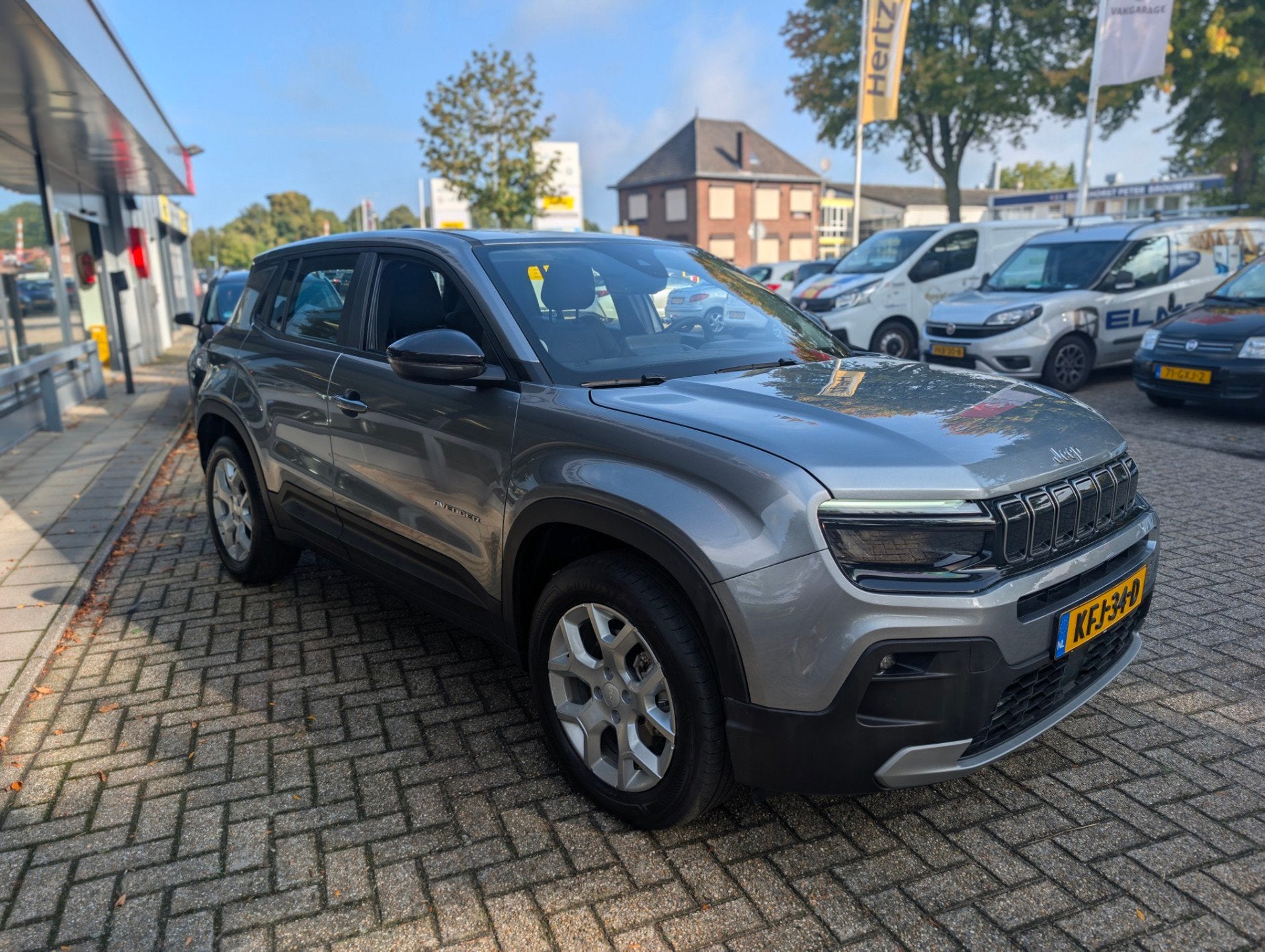 Jeep AVENGER 1.2 e-Hybrid Altitude, Rijklaarprijs / 12 mnd B, Auto's, Gebruikt, 1199 cc, 620 kg, Parkeersensor