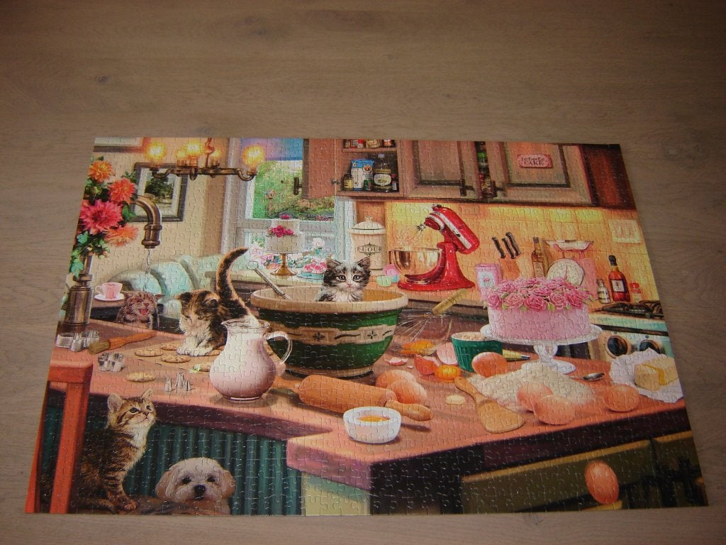 Puzzel Schmidt Steve Read AAN DE KEUKENTAFEL 1000 st., Ophalen of Verzenden, 500 t/m 1500 stukjes, Zo goed als nieuw, Legpuzzel