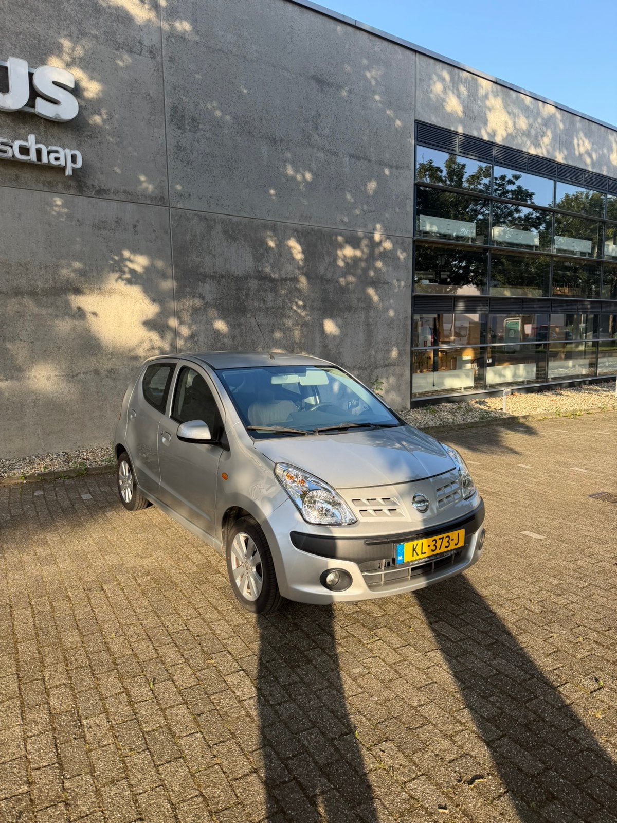 Nissan Pixo 1.0 50KW 5D 2013 Grijs airco, Voorwielaandrijving, Stof, 4 stoelen, Handgeschakeld