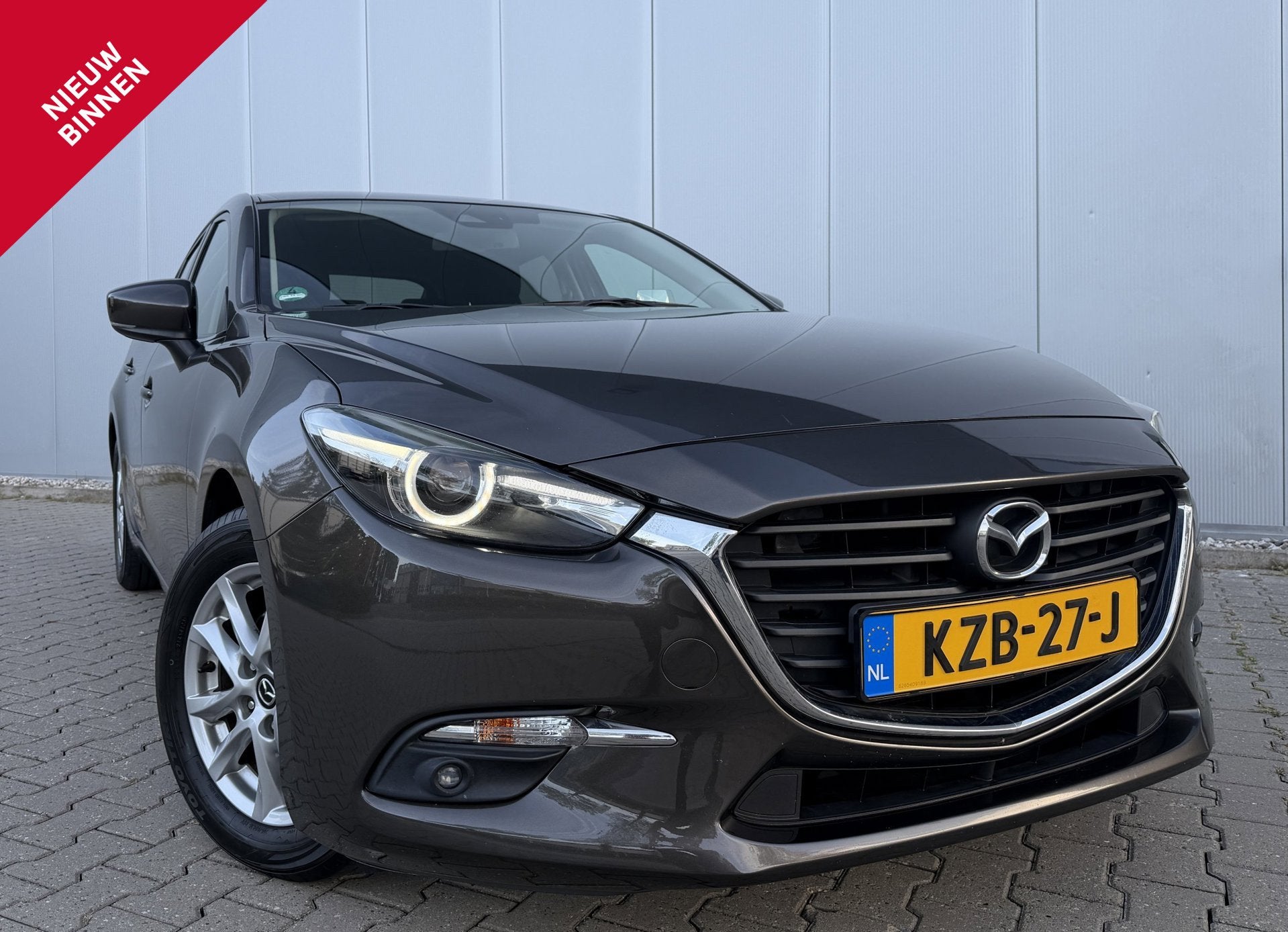 Mazda 3 2.0 SkyActiv-G 120 GT-M Automaat, Auto's, Gebruikt, Euro 6, 4 cilinders, Bruin