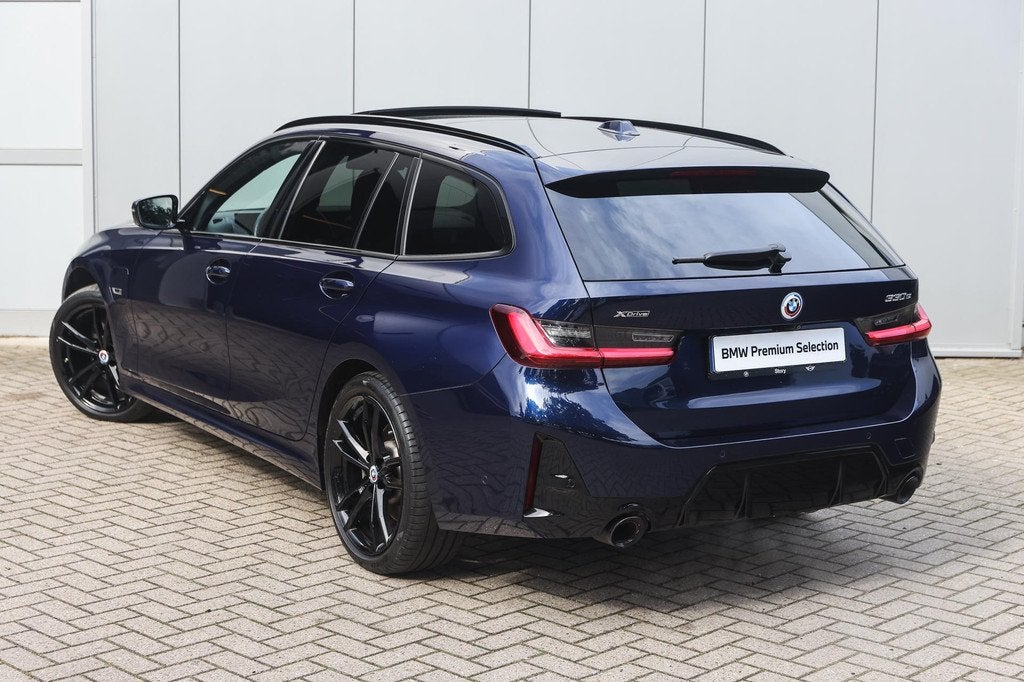 BMW 3 Serie Touring 330e xDrive M Sport Automaat / Trekhaak, Auto's, BMW, 1998 cc, Gebruikt, Met garantie (alle), Blauw