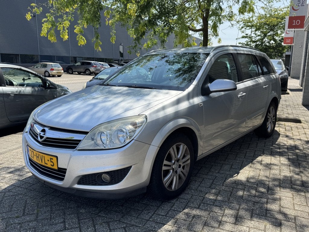 Opel Astra Wagon 1.6 Cosmo Leder Navi PDC NL Auto 214dkm!, Voorwielaandrijving, 15 km/l, Gebruikt, 116 pk